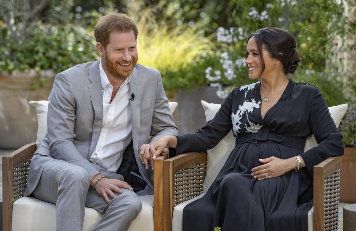 Enrique y Meghan
